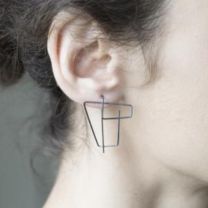 Mismatched architectural earrings